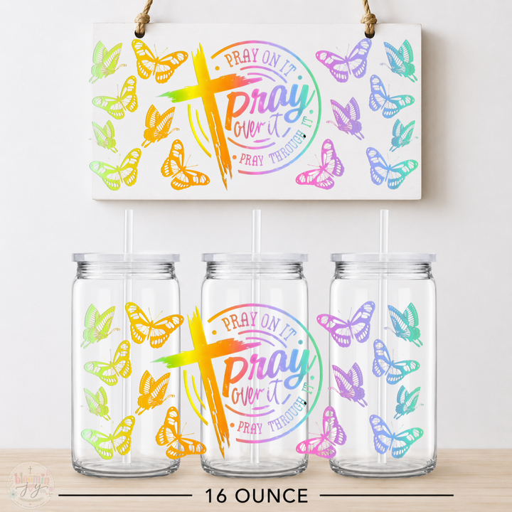 Pray On It, Pray Over It, Pray Through It Christian UV DTF wrap displayed on 16 oz acrylic cup